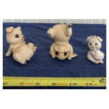 Hand painted pig figurines.