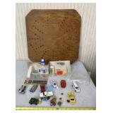 Marble board, marbles, cars and play cart sets.