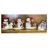 Hallmark motion Snowmen and tea candle holders.