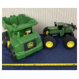 John Deere dump truck and sprayer toys.