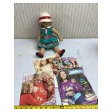 American Girl Doll with American Girl magazines.