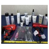 Blow dryers, brushes, hairspray and hair