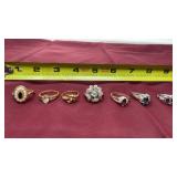 Golden silver tone rings some Avon with