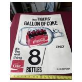 Older Coca-Cola advertising cardboard standup.