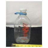 Dairy Lane half gallon milk jar with lid.