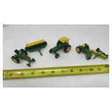 John Deere toy tractors with implements