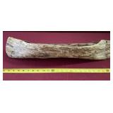 Handmade 25 inch long wooden canoe.