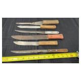 Old butcher, knives and bread, knives