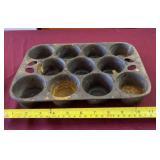 Cast iron muffin pan.
