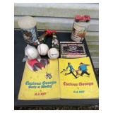 Curious George books baseballs metal cans with