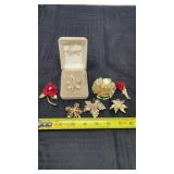 Flowers of Goldtone broaches , including citation