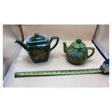 Hall Teapot featuring a dark olive green glaze,