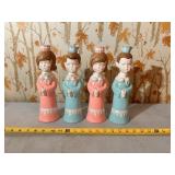 features vintage ceramic Christmas caroler