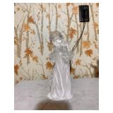 Mikasa Crystal Angel playing a harp.