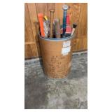 Feed Barrel full of Baseball Bats, Basketballs
