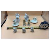 Collectible angel and cherub figurines.