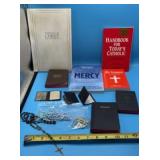 Collection of Catholic devotional items,
