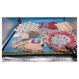 Handmade crochet doilies in various sizes,
