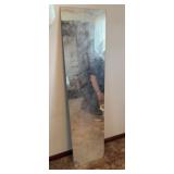 full-length, frameless mirror.