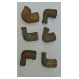 Six early Indian clay trade pipes.