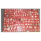 Indian artifacts glued to board