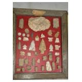 Indian artifacts glued to board