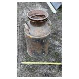 Rustic metal milk can