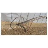 Old steel wheel Push Garden plow