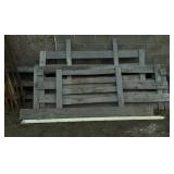 Weathered wooden fence panels or planks.