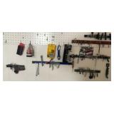 Contents on wall, tools, and hooks mostly drill