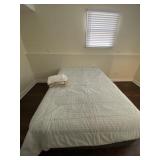 Light blue and white queen size comforter and