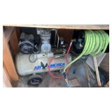 Air American air compressor with a real and hose
