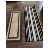Two runner rugs.