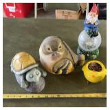 Decorative garden items, including a turtle