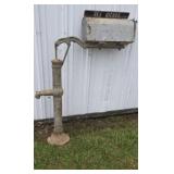 Old well pump mailbox stand