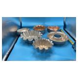 Jell-O molds in both silver and copper tones