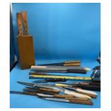 Variety of Kitchen Knives and a block