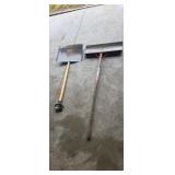 Two steel snow shovels.