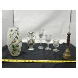 decorative items, including a cylindrical frosted