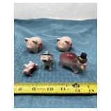 Japan pig figurines one with broken glued back on