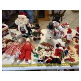 Christmas lot with Santa and snowman decor.