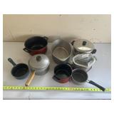 Club Aluminum cookware pieces, including various