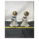 porcelain figurines featuring Victorian-style