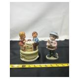 porcelain figurines include a musical trinket box