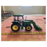 John Deere 5420 tractor equipped with a 541