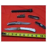 Assortment Of Pocket Knoves and Multi Tools