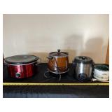 Crockpots and deep fryer.