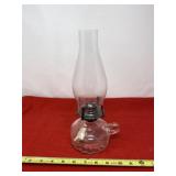 Chamber oil lamp features a clear glass base,