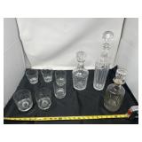 Glass decanters, crown royal glasses and red stag