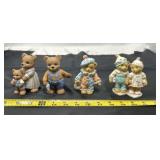 four vintage bear figurines, likely manufactured